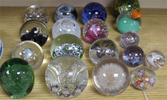 A collection of glass paperweights